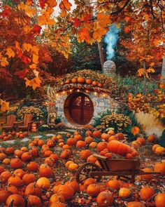 a painting of pumpkins in front of a hobbot with a fire place