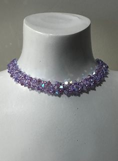 Genuine crystal, genuine crystal choker, chic, luxury jewelry, women, fashion, purple ab2x A color easy to tune, bright, to wear in any situation! Length to the clasp: 30 cm + 5 cm of chain Width: 0.8 cm Material: crystal, rocailles, stainless steel primers guaranteed without nickel We call crystal, the glass whose refractive index is equal or higher than 1.545. Unlike glass, crystal has more clarity, more brightness. Purple Necklace Crystal, Purple Jewelry Necklace, Purple Choker Necklace, Beaded Chokers, Purple Choker, Victorian Gothic Jewelry, Fashion Purple, Metal Choker, Choker Collar Necklace