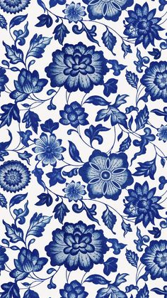 blue and white floral wallpaper with large flowers on the left side of the image