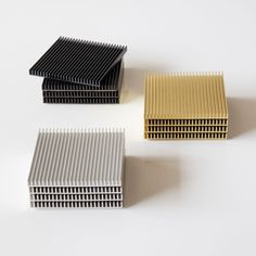 four different types of metal slats stacked on top of each other in various colors