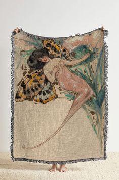 an image of a woman with butterflies on her body and legs hanging from a wall