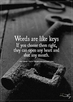 a pair of scissors sitting on top of a wooden table next to a quote that says words are like keys if you choose them right, they can open any heart and shut