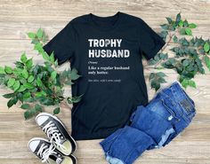 Clothing,Gender-Neutral Adult Clothing,Tops & Tees,T-shirts,Graphic Tees,Trophy Husband Shirt,Funny Husband Shirt,Gift for Husband,Gift From Wife,Funny Gift Husband,Anniversary Present,Best Husband Tee,valentines day gift,PBR Trophy Husband,PBR Husband Shirt,Husband Gift,new Husband shirt,Honeymoon Shirts DTF Printing T-shirts, Sweatshirts, and Hoodies. We use high-quality t-shirt brands such as Bella&Canvas, Gildan Soft-style shirts, and Gildan sweatshirts, hoodies. How to order🥰 👕Choose size Husband Shirts Funny, Funny Husband Shirts, Husband Birthday Gift, Trophy Husband, Funny Husband, Honeymoon Shirts, Husband Anniversary, Shirts Graphic, Gift Husband