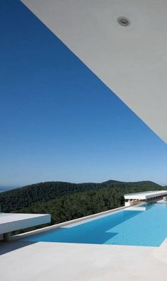 an empty swimming pool in the middle of a house