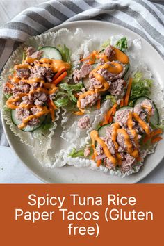 spicy tuna rice paper tacos gluten free on a white plate with text overlay