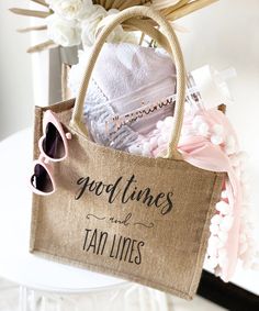 a bag with some clothes and sunglasses on it