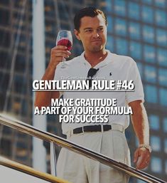 a man holding a glass of wine while standing on top of a stair case with the caption gentleman rules 46 make gratitude a part of your formula for success