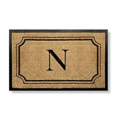 a door mat that has the letter n on it and is in front of a white background