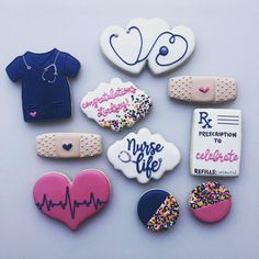 decorated cookies are arranged in the shape of heart, nurse's shirt and heartbeat