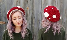 a woman with pink hair wearing a red and white crocheted mushroom hat