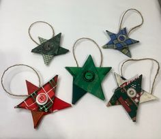 five ornaments are arranged in the shape of stars