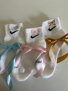 Feminine and sporty wear bow embroidered crew socks. These ribbon inspired designs have a bow embroidered on each side, girly trendy socks of the season. 1 PAIR only. This bow ribbon socks come in three colorways: light pink, light blue, tan. Quarter length socks. UNISEX SIZING: Medium (6-10) Women Large (10-13) Women This is offered in crew length as well. Please refer to the other listing if you want the longer pair. Sock Design Ideas, Coquette Socks, Girly Socks, Socks Bow, Ribbon Socks, Bow Socks, Embroidered Socks, Trendy Socks, Bow Ideas