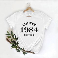 a white shirt with the words limited 1994 printed on it