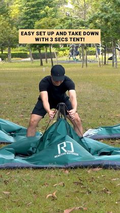 a man is setting up and taking down the tarp with 3 scis ten