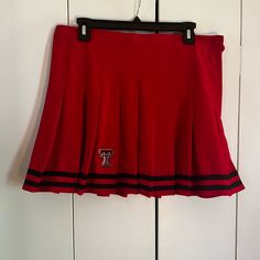 Brand New Tech Cheer Skirt. No Lining Or Shorts. Pleated Red Skirt With Black Stripes On Bottom. Texas Tech Logo Embroidered On Bottom Front. Zipper And Button On Side With Adjustable Button. So Cute But To Small Pleated Red Skirt, Texas Tech Logo, Blue Flower Skirt, Vintage Maxi Skirt, Tech Logo, New Tech, High Waisted Maxi Skirt, Vintage Versace, Retro Shorts