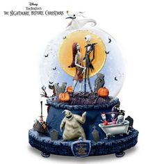 a snow globe with jack and sally in it