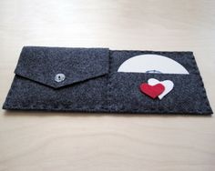 a felt case with two hearts on it