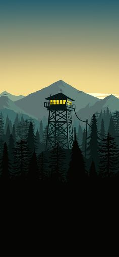 a tall tower sitting in the middle of a forest next to a mountain at night