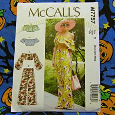 an image of a woman's top and pants sewing pattern