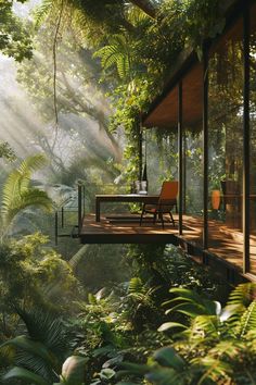 a deck in the middle of a forest with chairs and tables on it, surrounded by greenery