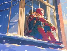 a spider - man sitting in front of a window on a snowy day