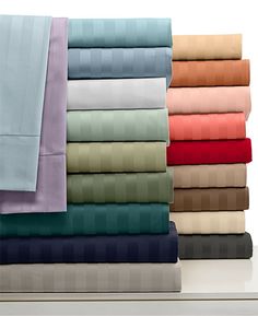 the sheets are neatly folded and ready to be placed on top of each other in different colors