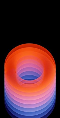 an orange, blue and pink tube on a black background in the shape of a circle