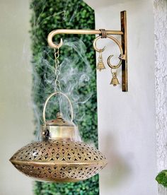 "Unique Handcrafted Cone Incense Holder , Give your room an exquisite antique look and add beauty with this Gold Incense burner. Perfect for \" New home gift, Housewarming gift, What's Included 1 x Iron Incense Burner, 1x Wall Hook/ Bracket, 1 x Candle Holder, 1x Brass Cone Holder Pin, 2 x Brass Bells, 1x Brass Chain, 2 x Screws, 1 x Cone Pack includes 20 Cones. Product Details This is a super fine indian Cone Insense Holder. This has the size of dia 23 cm x ht. 15cm. This Spiritual Decor is mad Spiritual Room, Casa Loft, Meditation Room Decor, Cone Incense, Zen Room, Puja Room, Spiritual Decor, Zen Decor, Pooja Rooms