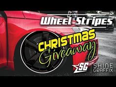 a red car with the words wheel stripes christmas giveaway on it's side