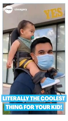 a man wearing a face mask holding a baby in his arms with the caption, literally the coolest thing for your kid