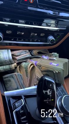 the inside of a car with money in it