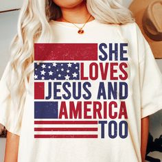 a woman wearing a t - shirt that says she loves jesus and america too