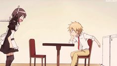 two anime characters sitting at a table