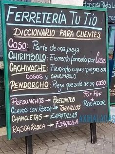 a menu board with spanish writing on it