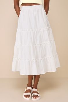 From farmers markets to fun festivals, the Lulus Dearest Cutie Ivory High Rise Tiered Midi Skirt is ready to create a variety of looks for a variety of occasions! Frolic through the season with this lightweight woven poplin skirt that features a high, elasticized waistband and a tiered, A-line silhouette that falls to a breezy midi hem. Fit: This garment fits true to size. Length: Mid-calf length. Size medium Waist: Fitted - very fitted at natural waist. Hip: Not Fitted - fuller skirt allows roo Outfits With White Midi Skirt, White Tiered Skirt, Shirred Skirt, Poplin Skirt, Mid Length Skirt, White Midi Skirt, Fabric Skirt, White Maxi Skirts, Tiered Midi Skirt