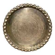 an antique silver plate on a white background