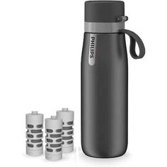 thermos bottle with four cups next to it on a white background and three smaller ones in front