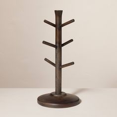 a wooden stand with several branches on it