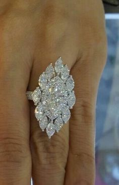 "Specification:- *Diamond Material : Cubic Zirconia *Total Diamond Weight : 4.01 Ct (Approx.) *Center Diamond Cut : Marquise *Center Diamond Dimension : 10*5 MM *Center Diamond Weight : 1.00 CT *Side Diamond Dimension: 2.00, 2.40, 2.50, 5*2.5 MM *Side Diamond Weight : 3.01 CT *Diamond Color : White *Diamond Clarity : VVS *Making Process: Handmade by our Experienced Staff. *Stamp: Our All Rings Stamped According to metal Purity (925 SIL/10K/14K/18K). Custom Order:- *We do Accept Custom order. Marquise Cut Diamond Ring, White Gold Wedding Ring, Ladies Diamond Rings, White Gold Wedding Rings, Set Ring, Stone Engagement Rings, Diamond Set, Gold Wedding Rings, 925 Silver Jewelry