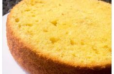 a yellow cake sitting on top of a white plate