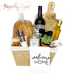 a welcome home basket filled with food and wine