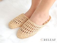 Cute women indoor slippers made from straw. Designs for unisex adult shoes slippers.  Are you looking for a gift for someone you love ? ❊ This straw slippers could be a good choice for Bridesmaid slippers and wedding slippers ❊ It looks vintage and classic, gift for mother or gifts for grandma even gift for him are so creative ideas.  ❊ Size:  Small:  3.5 - 4.5 US Medium: 5.5 - 7 US Large: 7- 8.5 US  Ethical and Sustainable ❊ Our slippers shoes are made of recycled water grass. ❊ No micro-plastic released when cleaned. ❊ Each slippers is unique and individually handwoven. As our bags are handcrafted, there may be slight variations in dimensions, colour, and texture. ❊ By purchasing our products you are supporting our local female artisans. -------------------------------------------------- Straw Slippers, Bridesmaid Slippers, Slippers Cute, Bride Slippers, Spa Slippers, Wedding Slippers, Water Grass, Gifts For Grandma, Indoor Slippers