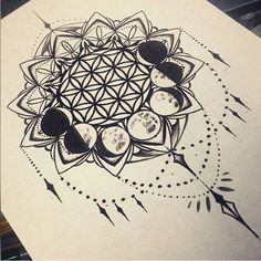 a drawing of a flower of life surrounded by other flowers and arrows in black ink