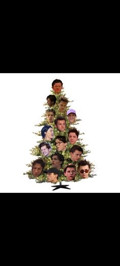 a christmas tree with many different faces on it's sides and the bottom half