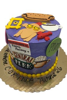 a cake decorated with cartoon characters on it