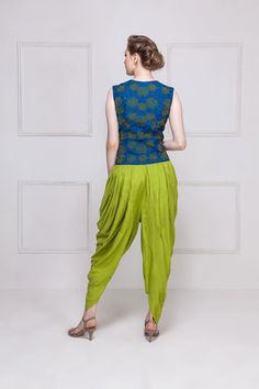 HOUSE OF OMBRE. Blue & green embroidered vest top with green dhoti pants Long Tops Designs, Plazo Designs, Patiala Pants, Women Trousers Design, Embroidered Vest, Punjabi Fashion, Designer Punjabi Suits, Dhoti Pants, Stylish Party Dresses