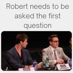 two men sitting at a table talking to each other with the caption robert needs to be asked the first question