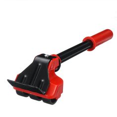 a red and black plastic handle on a white background
