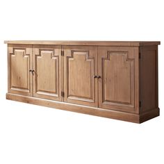 a large wooden cabinet with two doors and three cupboards on the bottom side,