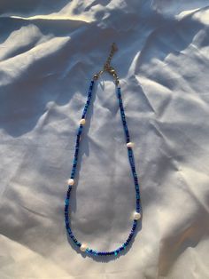 beautiful deep blue beads with freshwater pearls ⭐️💙 All necklaces are about 16-18 inches (unless specified to be longer or shorter) & comes with an attached, adjustable silver chain! :) So you can adjust it to your liking (longer or shorter)🤍 Seed Bead Necklace, Jewelry Inspo, Deep Sea, Blue Beads, How To Make Beads, Bead Necklace, Chain Styles, Seed Bead, Deep Blue